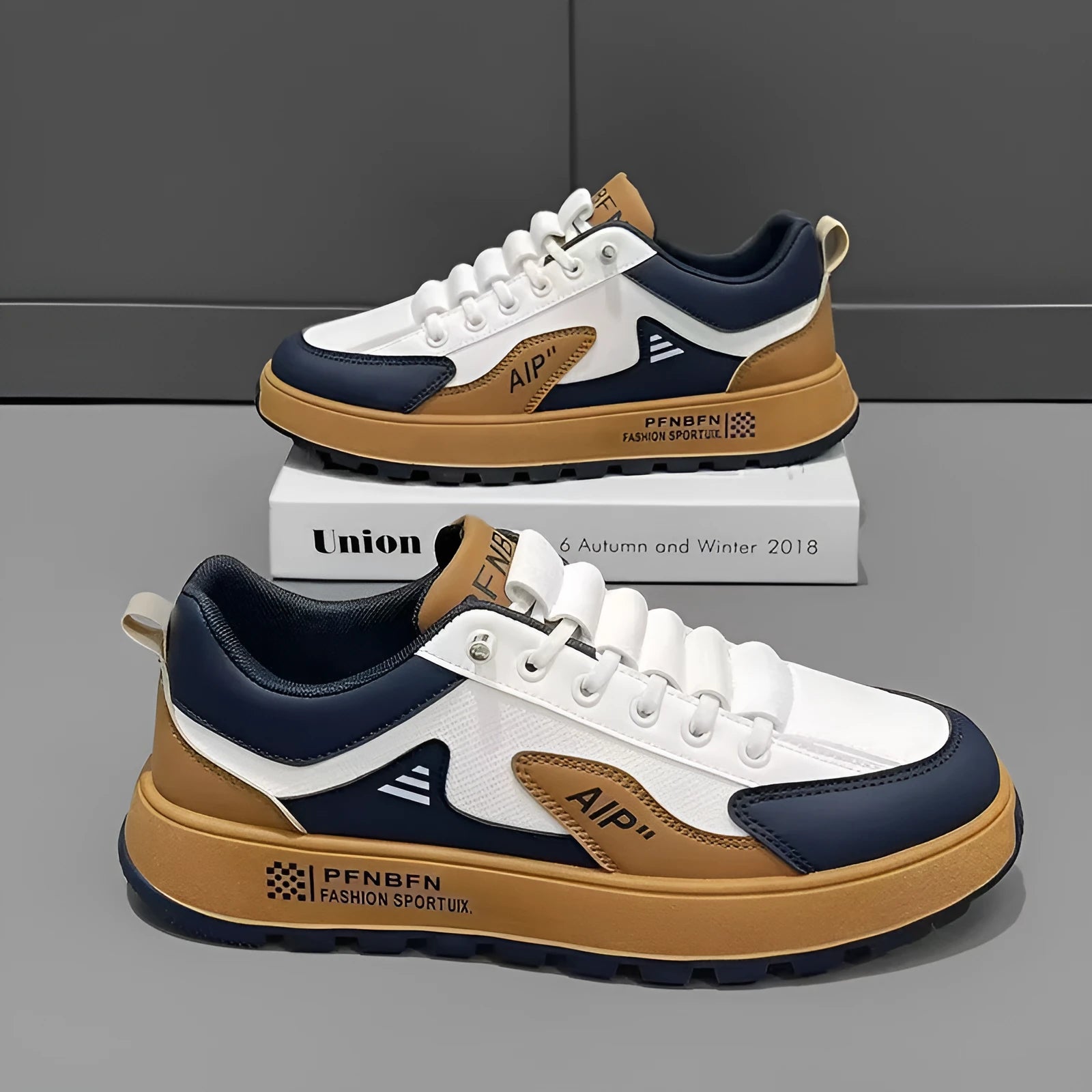 Men's white casual sports shoes with round toe and choice of orange, black, or brown accents on artificial PU upper.