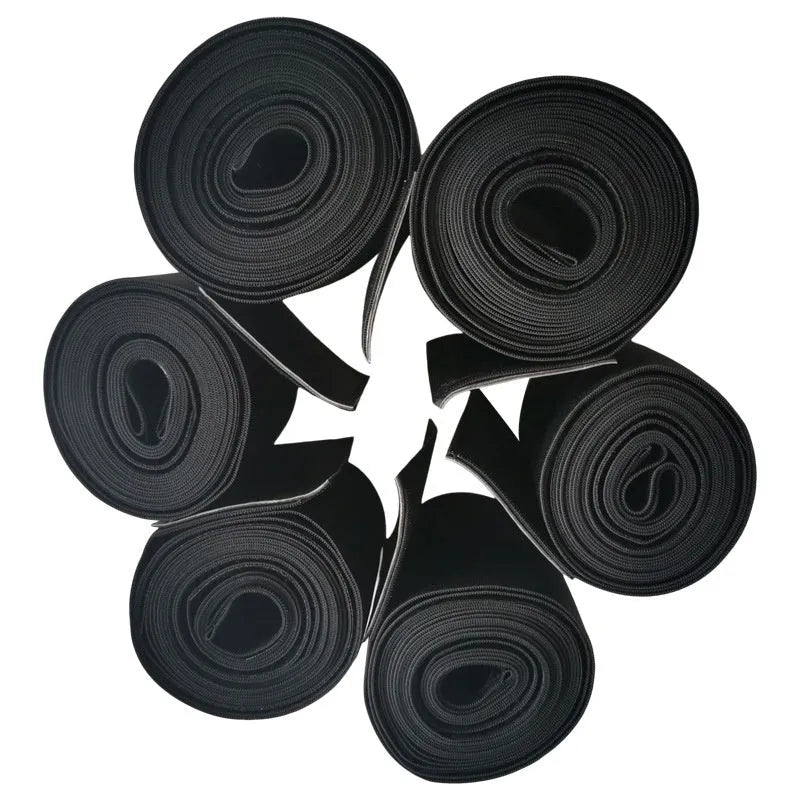 Women's black waist trainer exercise restraint belt showing its 10cm width and long length.