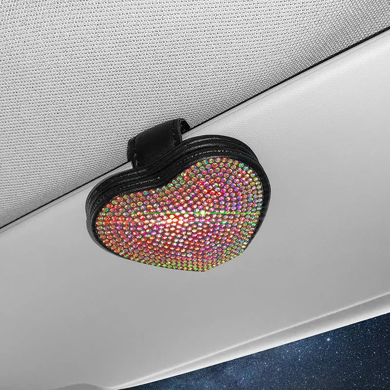 Black PU leather car sun visor clip with diamond accents holding sunglasses and a ticket.