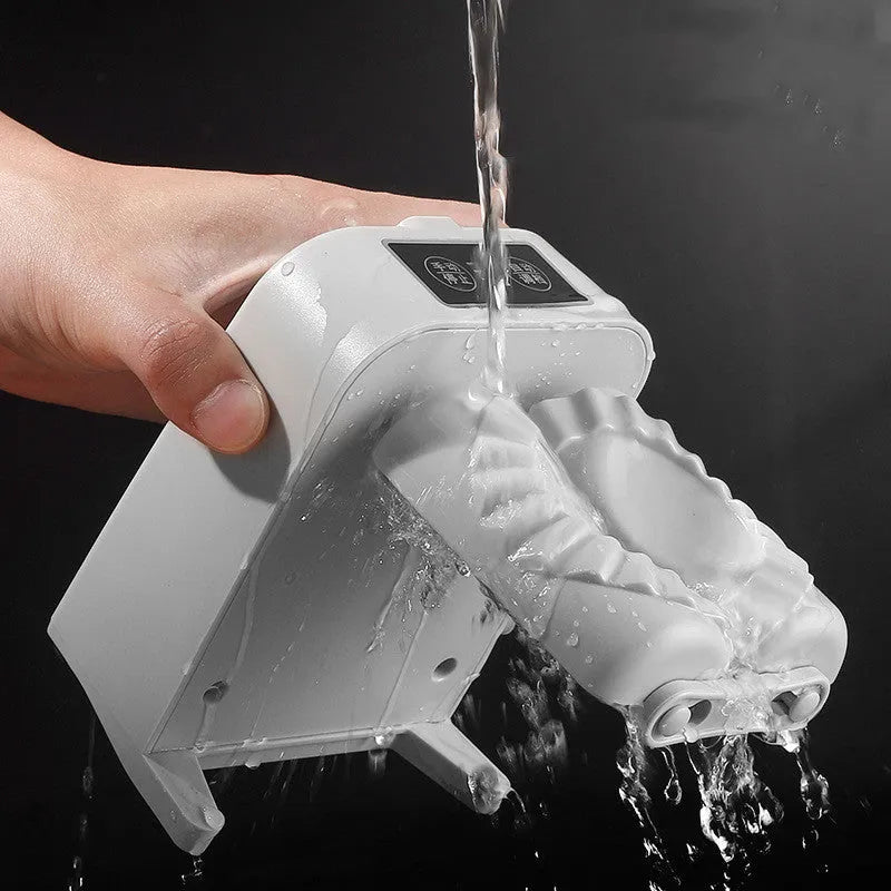 White electric dumpling maker machine with modern design on kitchen countertop