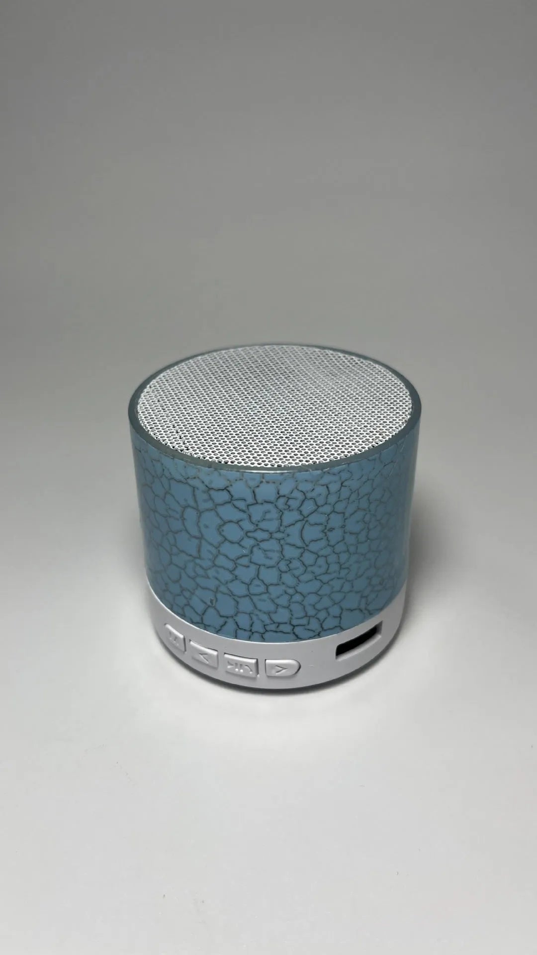 A9 Mini Cracked Bluetooth speaker in white with cracked-effect finish and LED lights