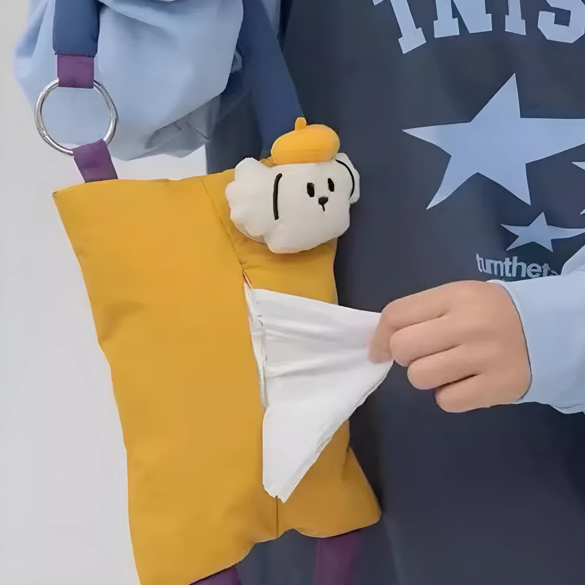 Soft plush hanging car tissue bag in hat dog design, showing hanging loop and pouch.