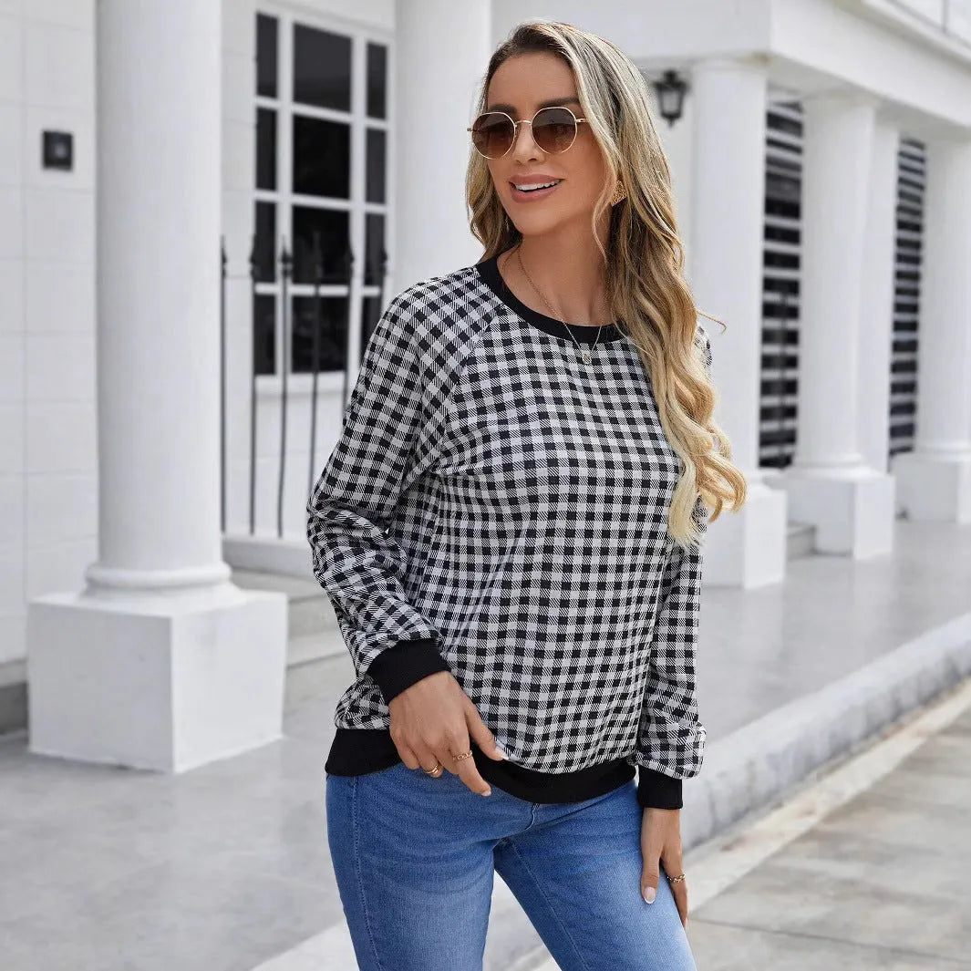 Black Japanese plaid pullover sweater with printed stripe patterns and long sleeves