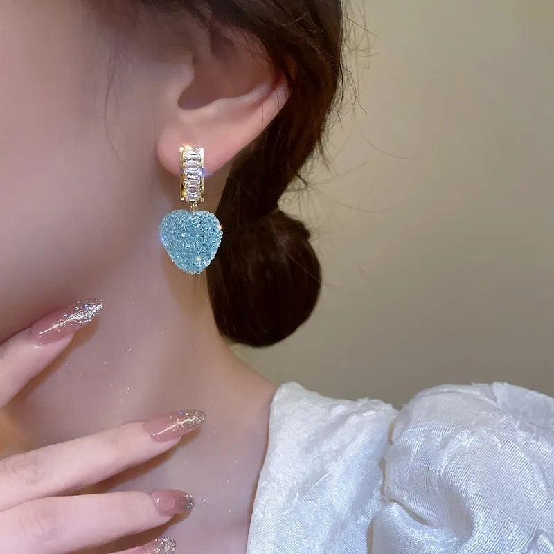 Alloy heart peach design candy stud earrings in pink or blue colour options