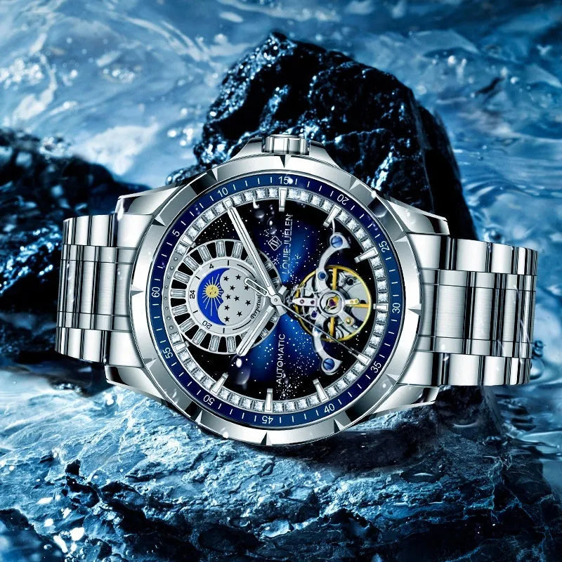 Silver and blue men's automatic mechanical watch with a stainless steel bracelet on a wrist