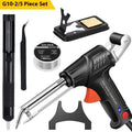 Black G102 alloy soldering gun with light from a five piece tool kit on a workbench.