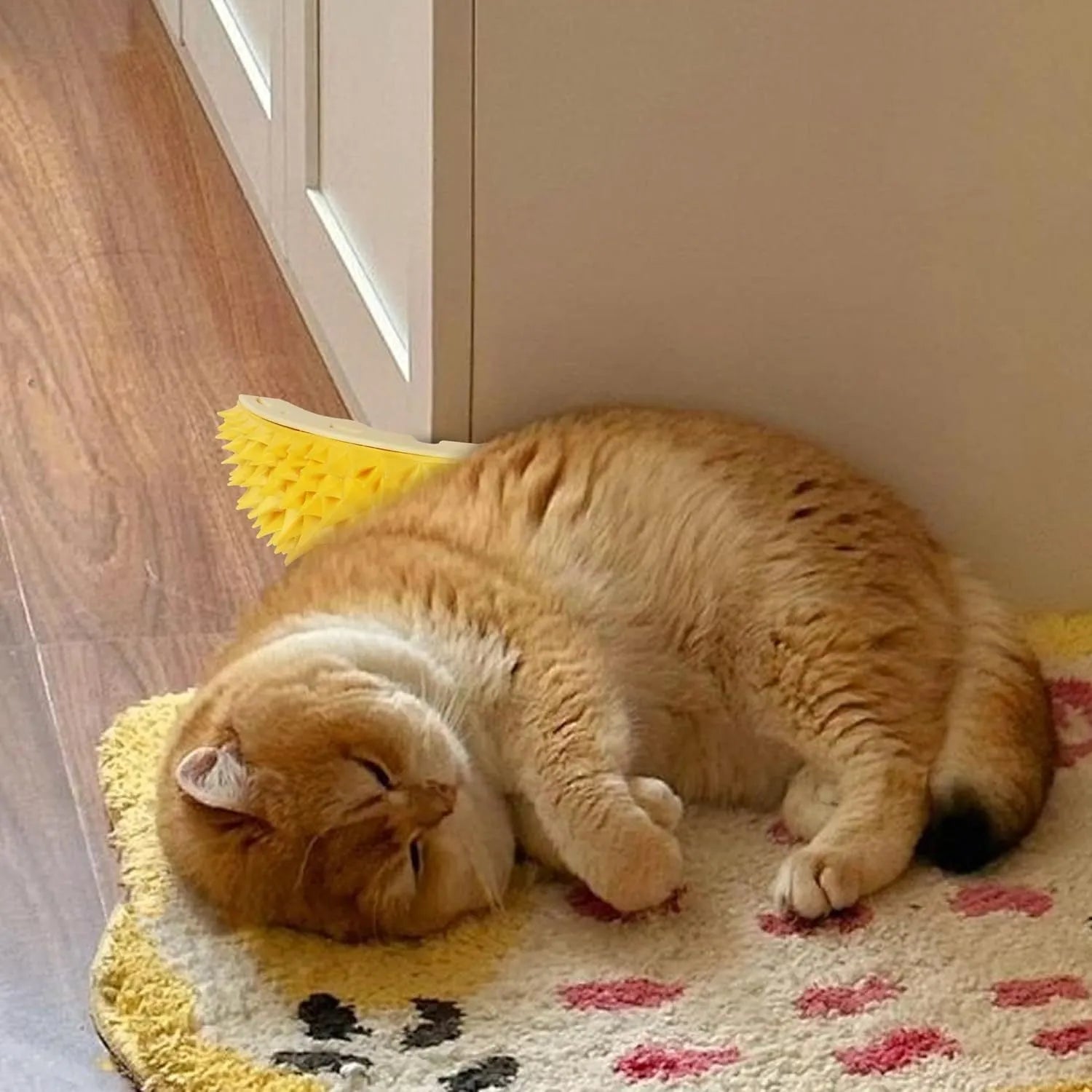 Yellow durian-shaped cat corner scratcher with comb surface mounted on wall corner