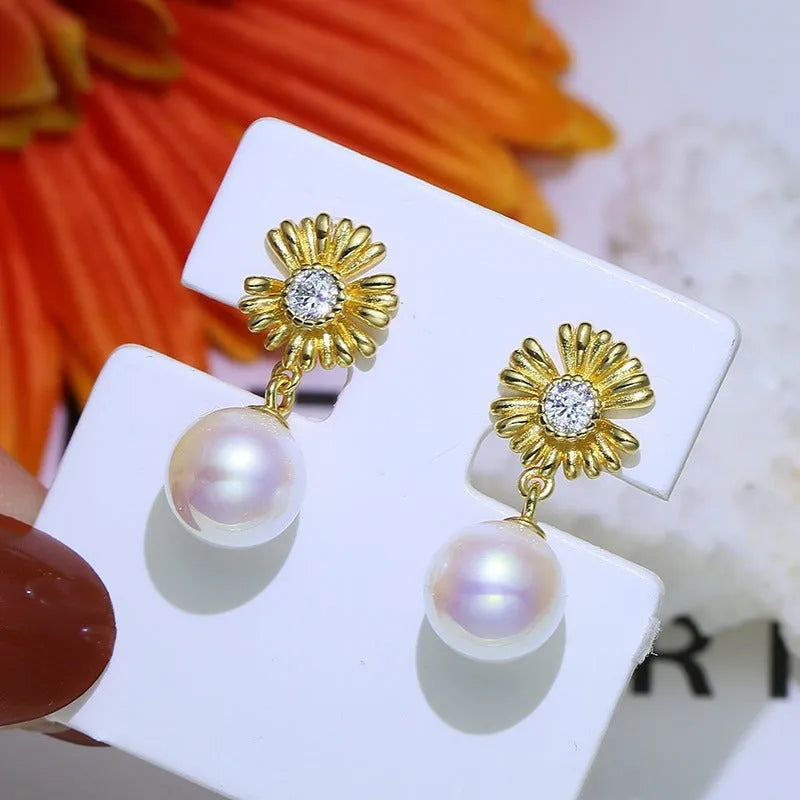 Baroque floral sterling silver earrings with ring holder function in silver and gold plating options.