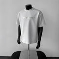 Men's cotton short sleeve t-shirt in loose fit pullover style available in black, white and light grey