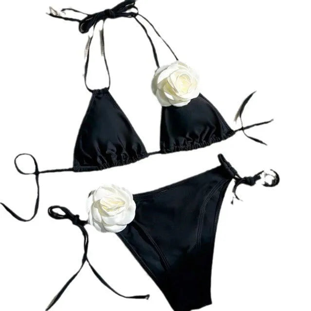 Black women's bikini set with 3D flower patterns, drawstring waist, and backless briefs design