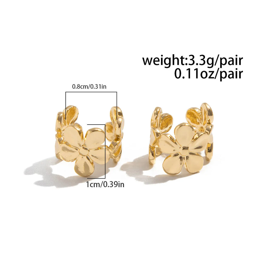 Gold electroplated alloy earrings with starfish and conch designs for women.