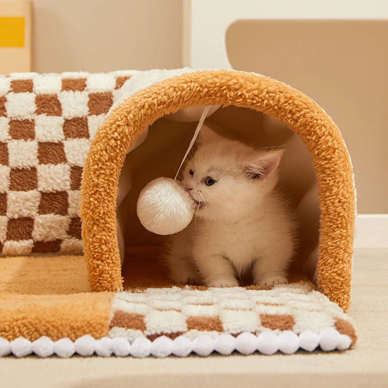 Soft plush fan-shaped 2-in-1 pet bed and tunnel for dogs and cats in plaid design.