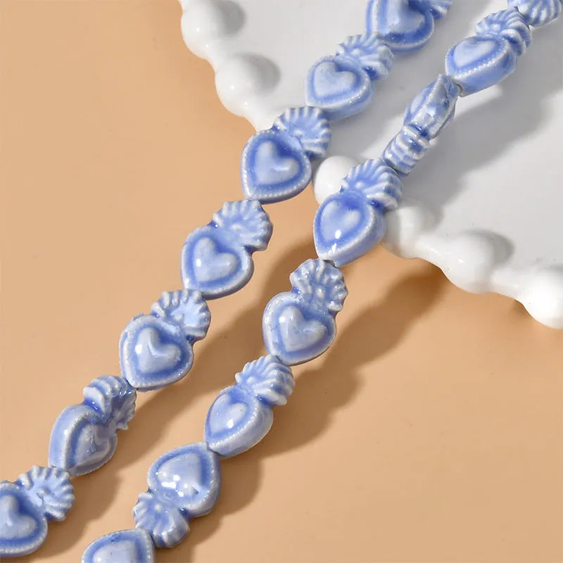 Ceramic love heart small torch shaped beads in various colours with straight holes for jewellery making