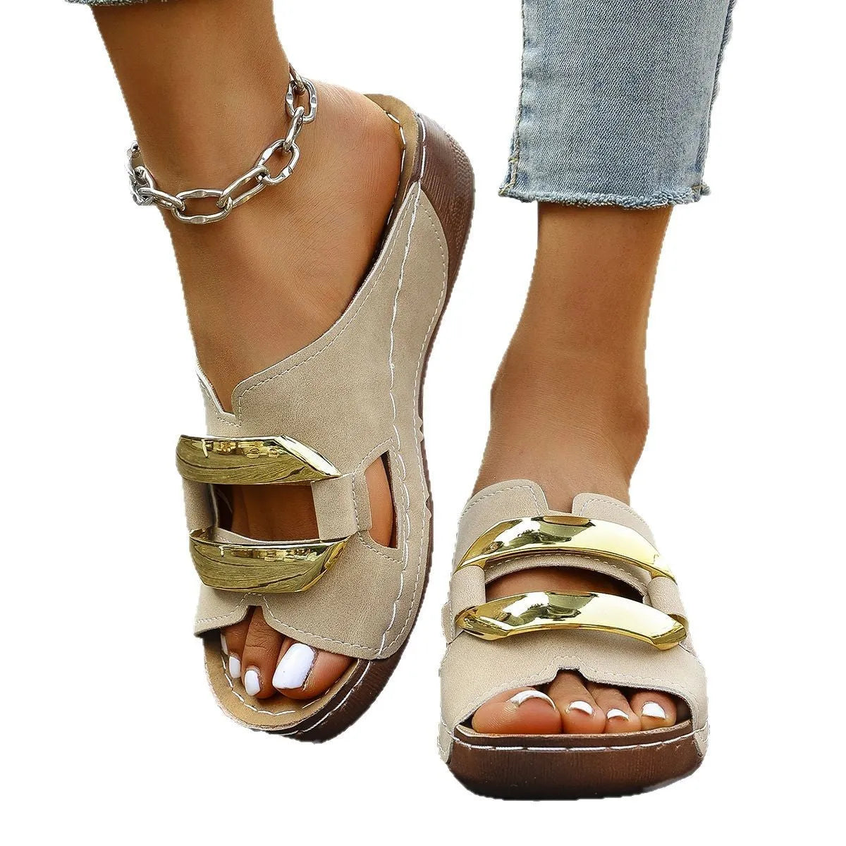 Roman style platform sandals in black, featuring a flat heel, rubber sole, and metallic decorative details.