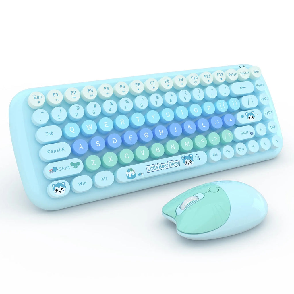 Candy Pink wireless keyboard and mouse set on a desk, showing compact size and USB receiver.