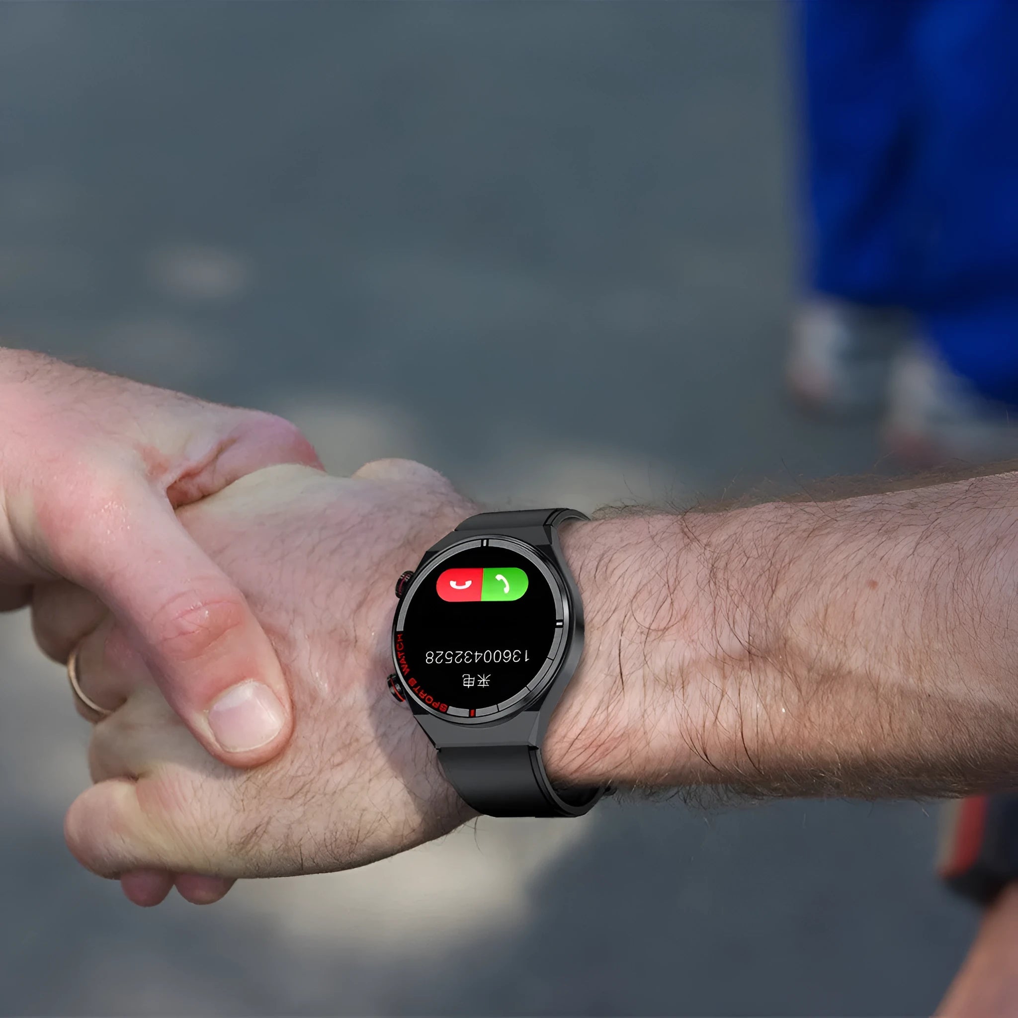 Black rotary key Bluetooth smart watch with brown genuine leather strap on a wrist.