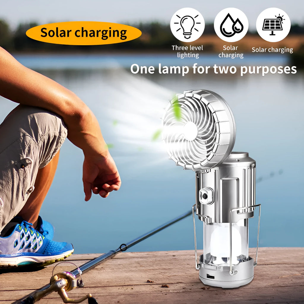 Solar electric fan lantern with waterproof casing and LED light in silver colour for camping use