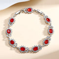 Personality Trend women's simple bracelet with inlaid zircon stones in one of nine gemstone colours on alloy band.