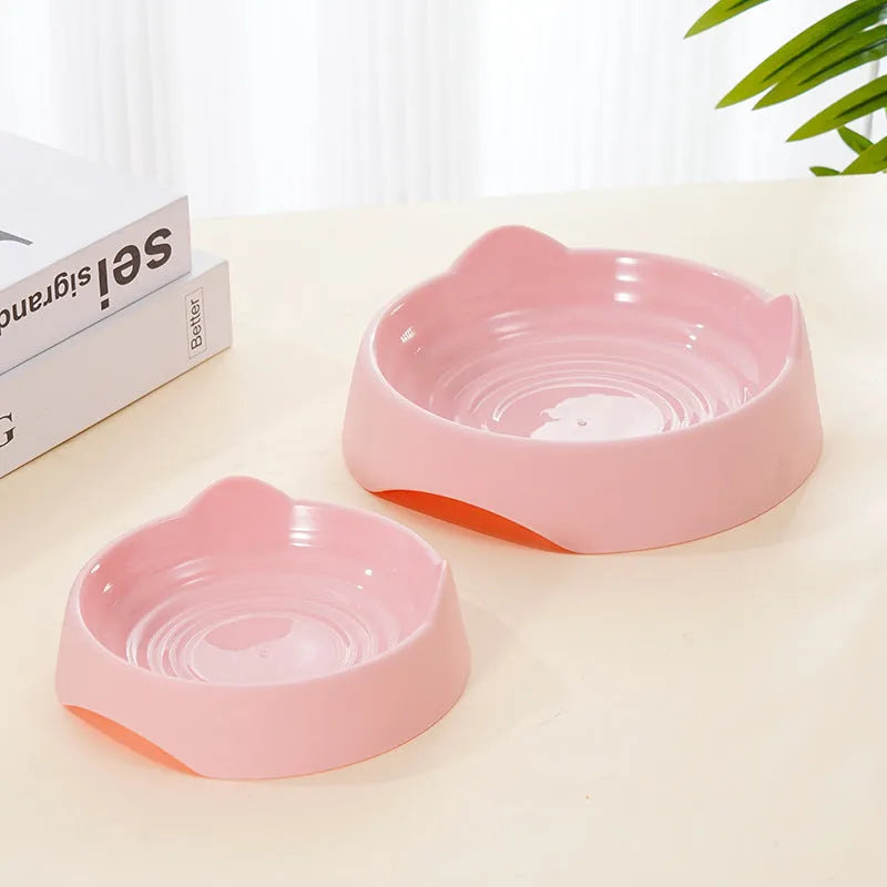 Ceramic dog slow feeder puzzle bowl in blue, green, or pink colours shown in two size options