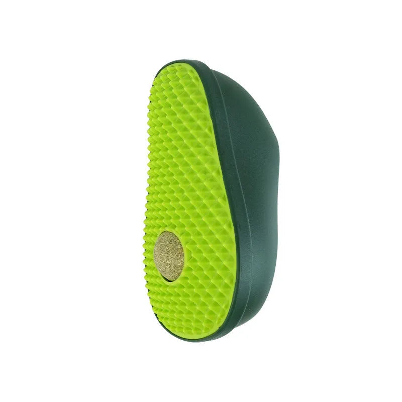 Green avocado-shaped cat scratching post toy on a plain background.