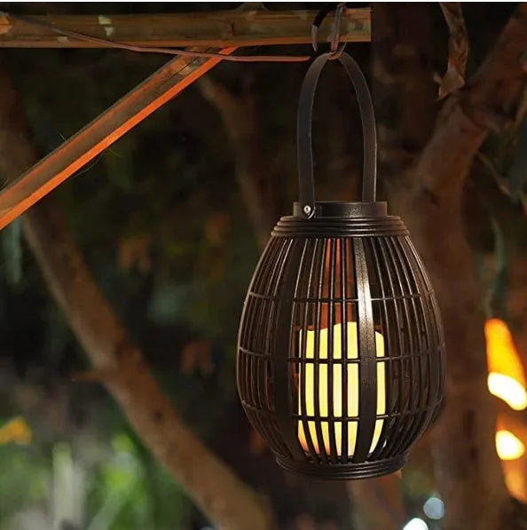Retro style solar garden light with oval rattan shade in picture colour finish