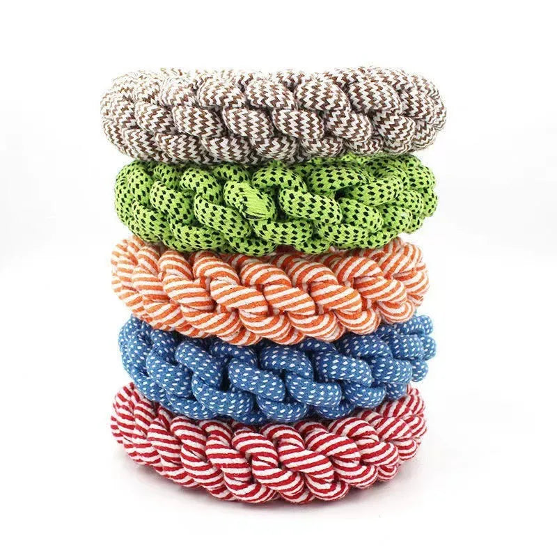 Cotton braided ring dog toy approximately 18cm in circumference with textured knot design