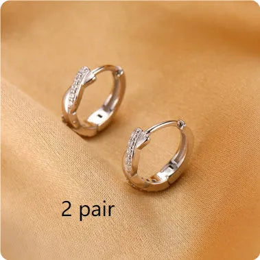 Geometric hoop earrings with hemp rope elements in gold or silver copper finish