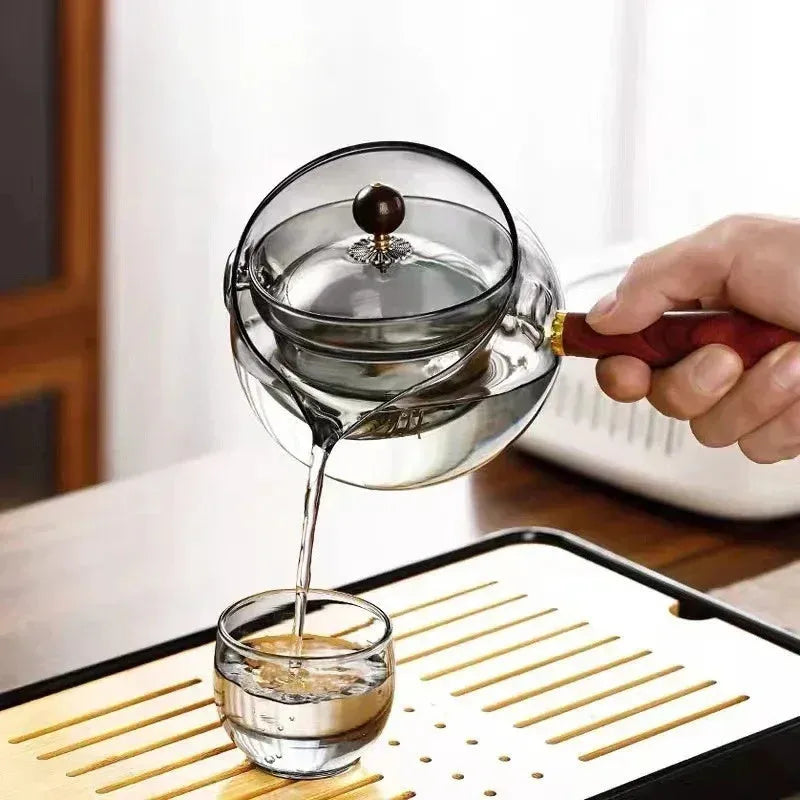 Semi-automatic rotary glass teapot with wooden handle and infuser in transparent borosilicate glass