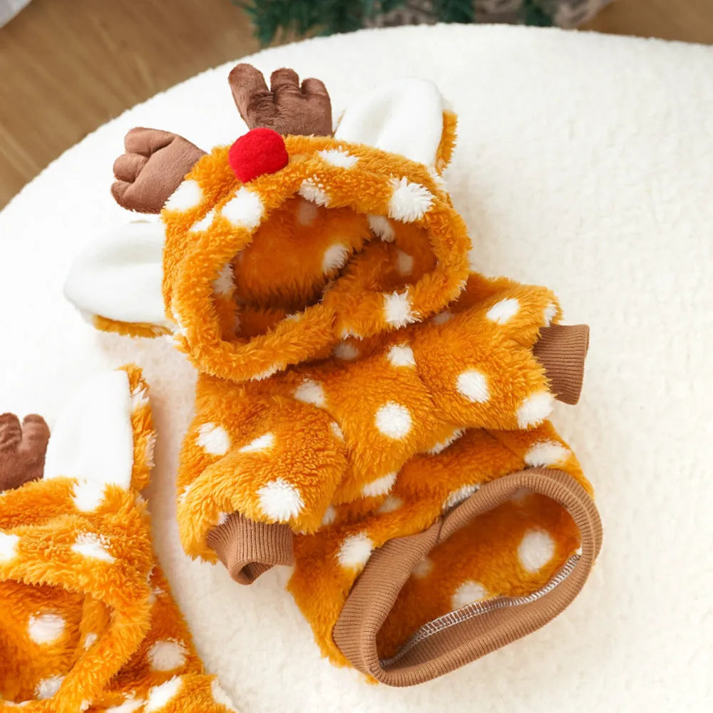 Elk Christmas dog costume with fleece lining on small white dog showing two-leg design and festive pattern