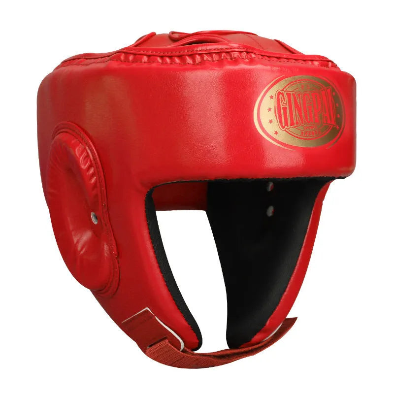 Red fully enclosed boxing helmet with jaw protection and vertical ventilation channels