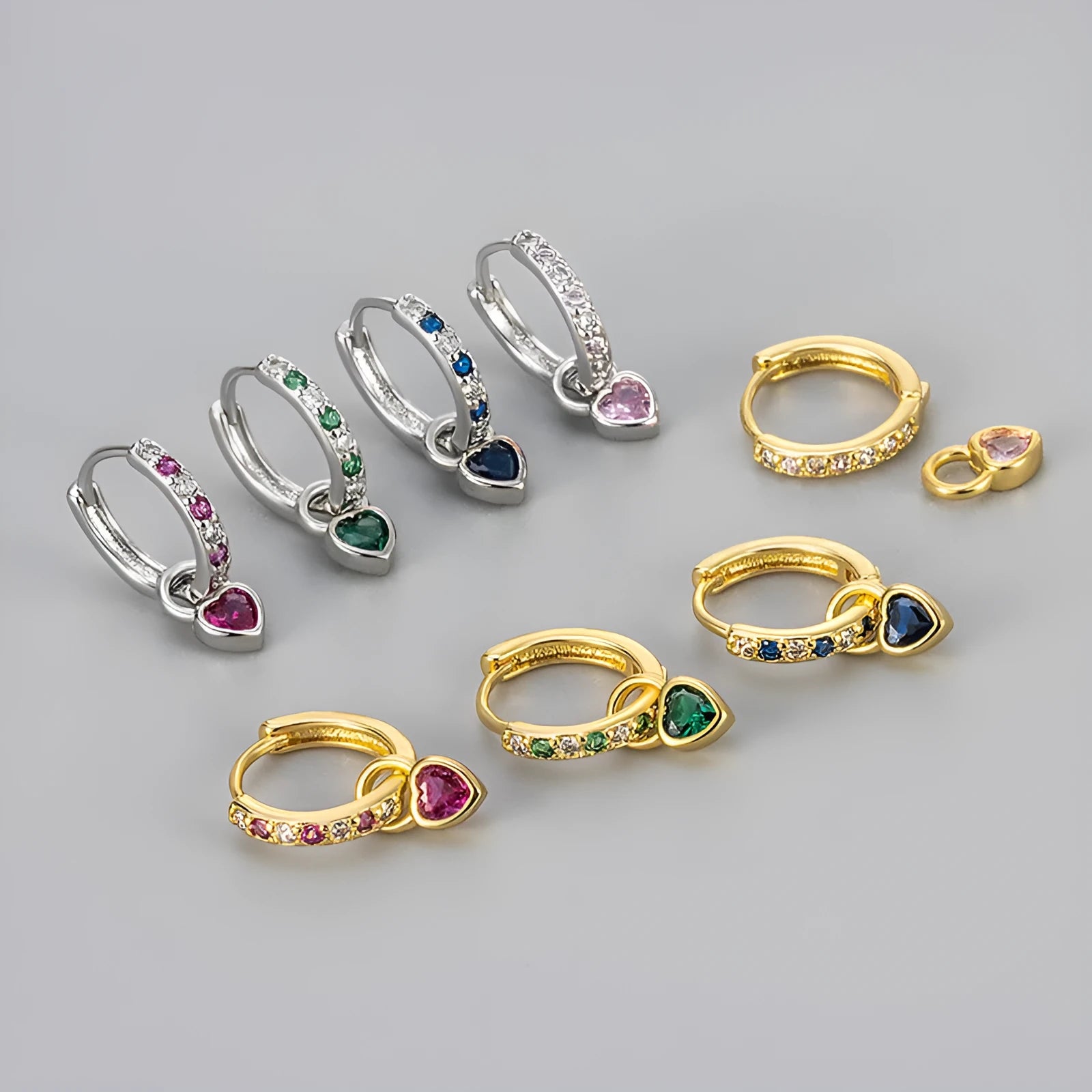 Women's heart-shaped drop earring with a dangling coloured stone, available in gold or white gold plating.