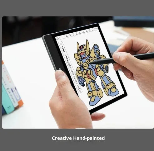Black 7-inch colour E-ink e-book reader with capacitive stylus on a desk