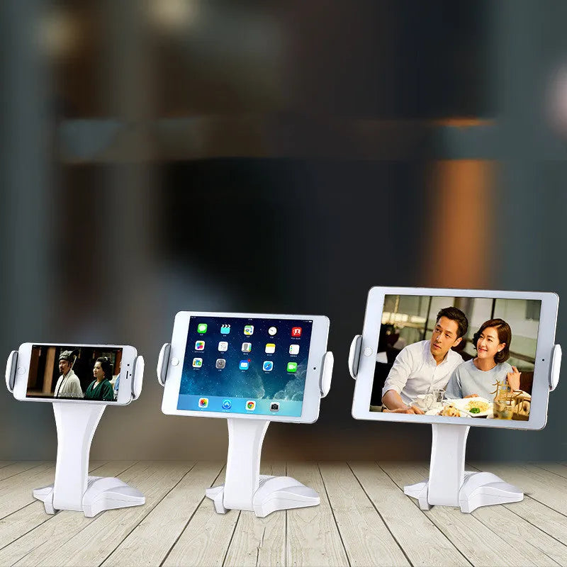 White tablet stand with adjustable clip holding a tablet at 250 mm height
