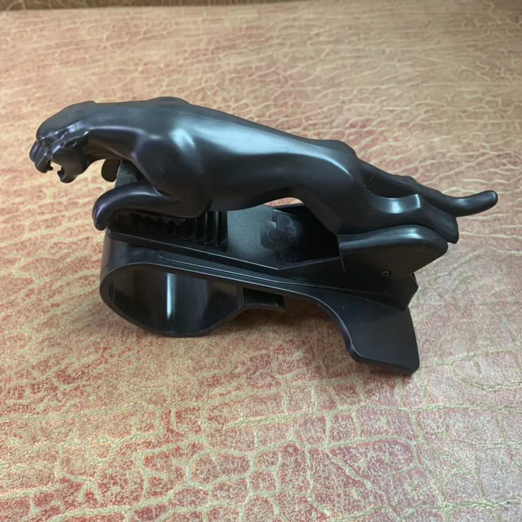 Rotatable car phone holder bracket in black mounted on windscreen