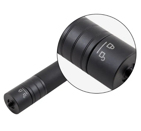Black retractable selfie stick extended to full length with phone attached, showing detachable tripod legs and wireless remote.