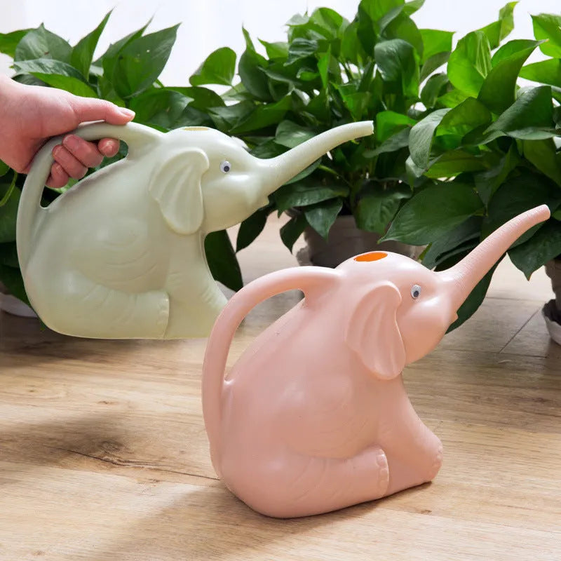 Blue elephant-shaped children's plastic watering can with a long nozzle and ergonomic handle.