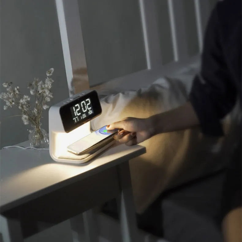 White 3-in-1 bedside lamp with wireless charging pad, LCD clock screen, and touch dimming controls