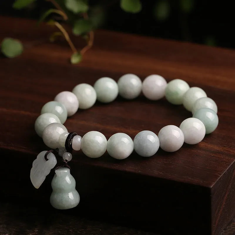Natural jade Buddhist prayer bracelet with geometric beads and hanging charm pendant