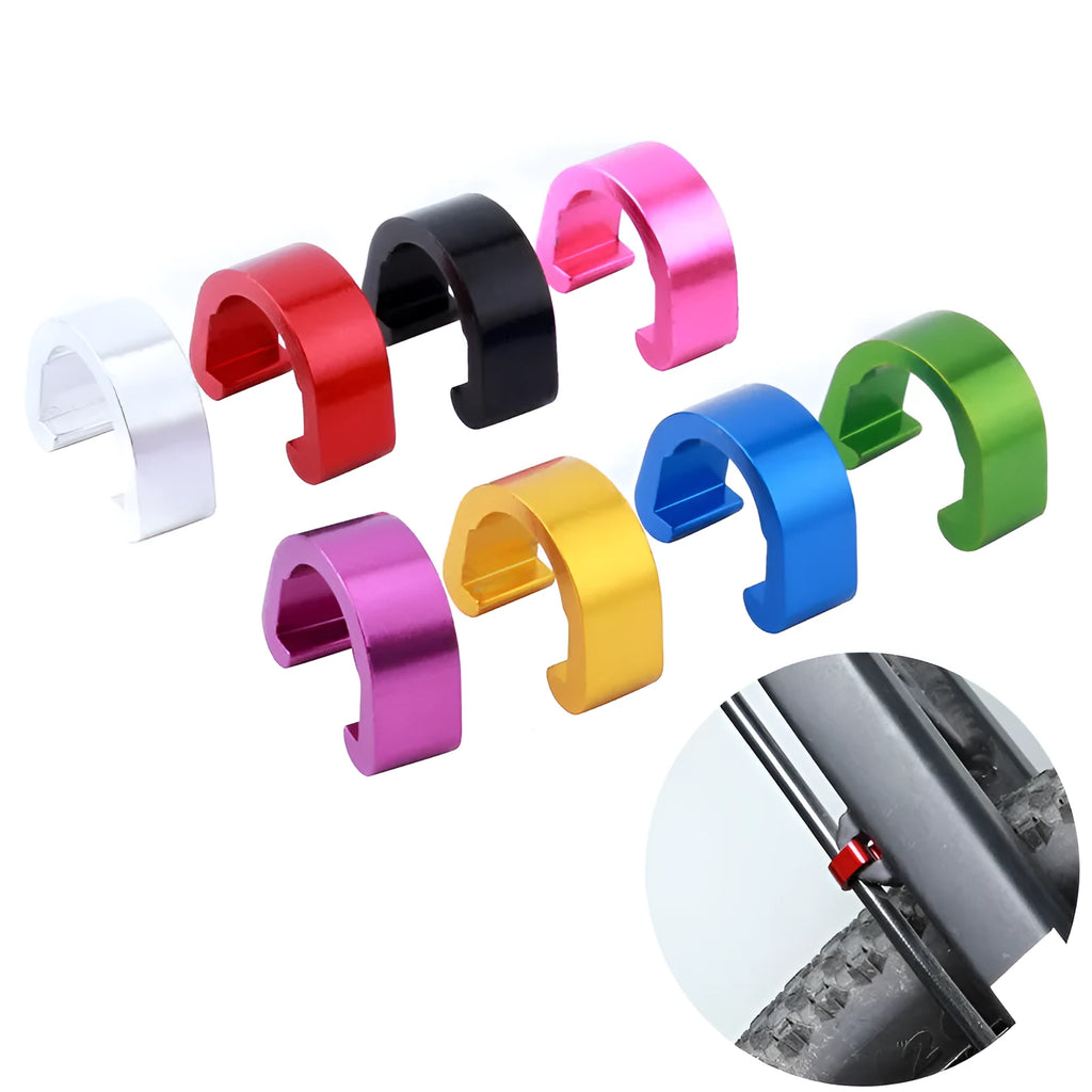 Ten small aluminium C-shaped buckles in assorted colours including black, blue, gold, and red.