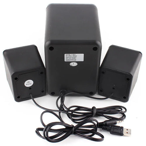 Green U-2600 2.1 USB computer speaker with colourful glowing lights on a desk