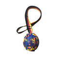 Yellow and camouflage EVA foam floating dog tetherballs in three different sizes for water fetch