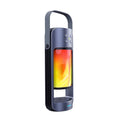 Portable Bluetooth speaker with yellow dancing flame light effect showing wireless charging surface