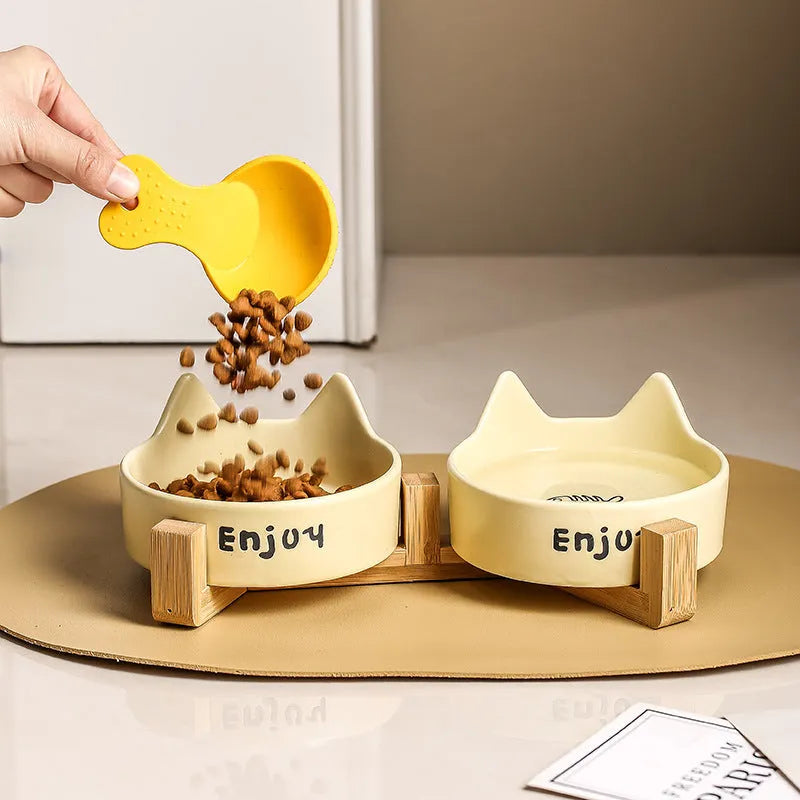 Porcelain cat food and water bowl set with wooden anti-tumble frame in various colours