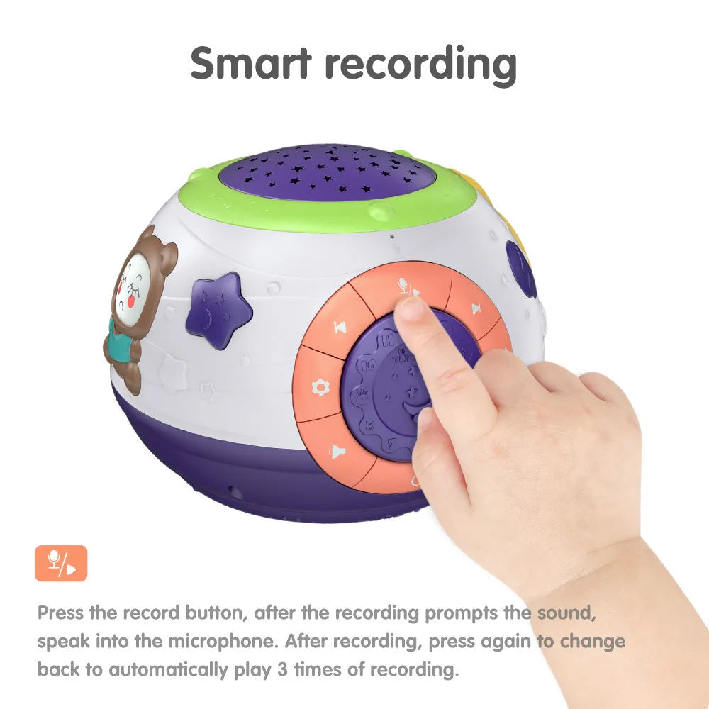 White plastic starry sky night light projector for children with control button on top.