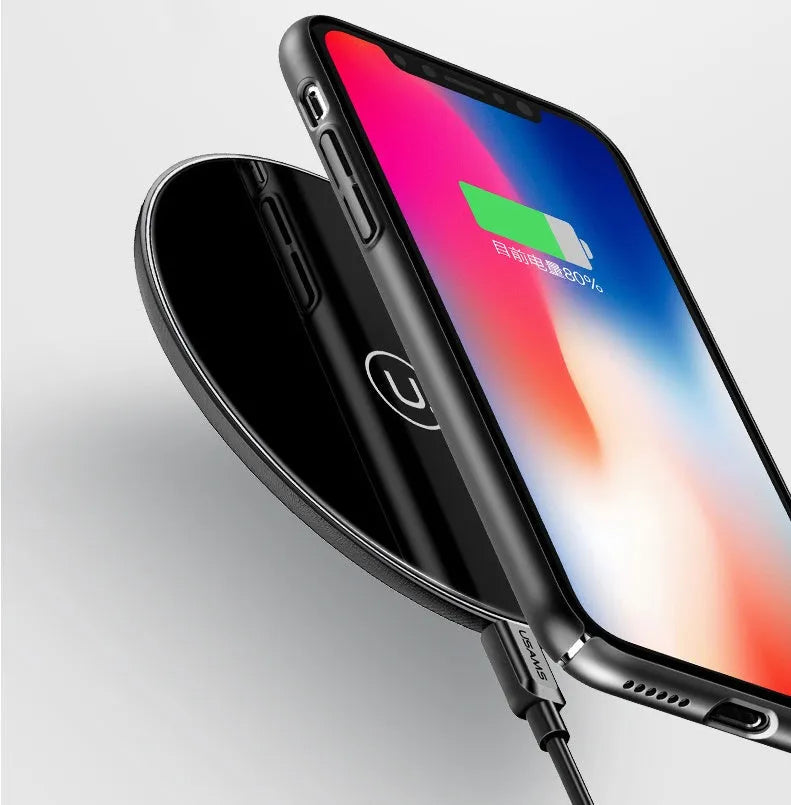 Glass disc wireless charger for smartphones in black or white with charging indicator