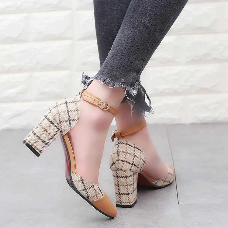 Thick heel high heels with buckle fastening, black colour, 7.5cm heel, side view