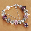 Multicolour beaded bracelet with alloy, glazed, and diamond beads on a white background