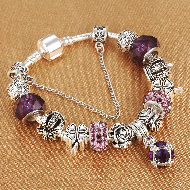 Multicolour beaded bracelet with alloy, glazed, and diamond beads on a white background