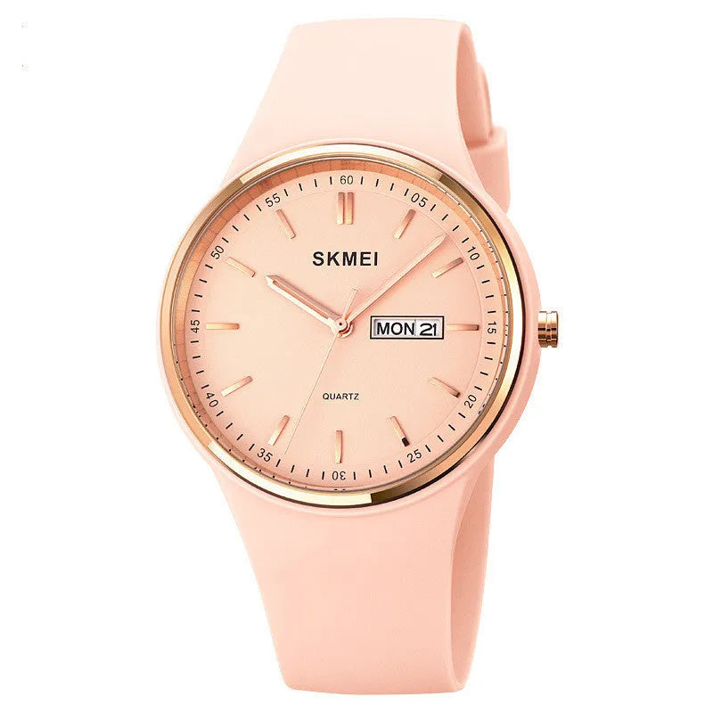 Women's silicone strap quartz watch with calendar, waterproof 30m, on wrist showing 42mm dial.