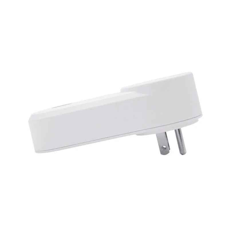 White wifi smart socket with UK British Standard three-pin plug on a table.